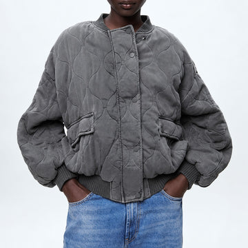 Dámská prošívaná bunda oversized s patentkami a kapsami