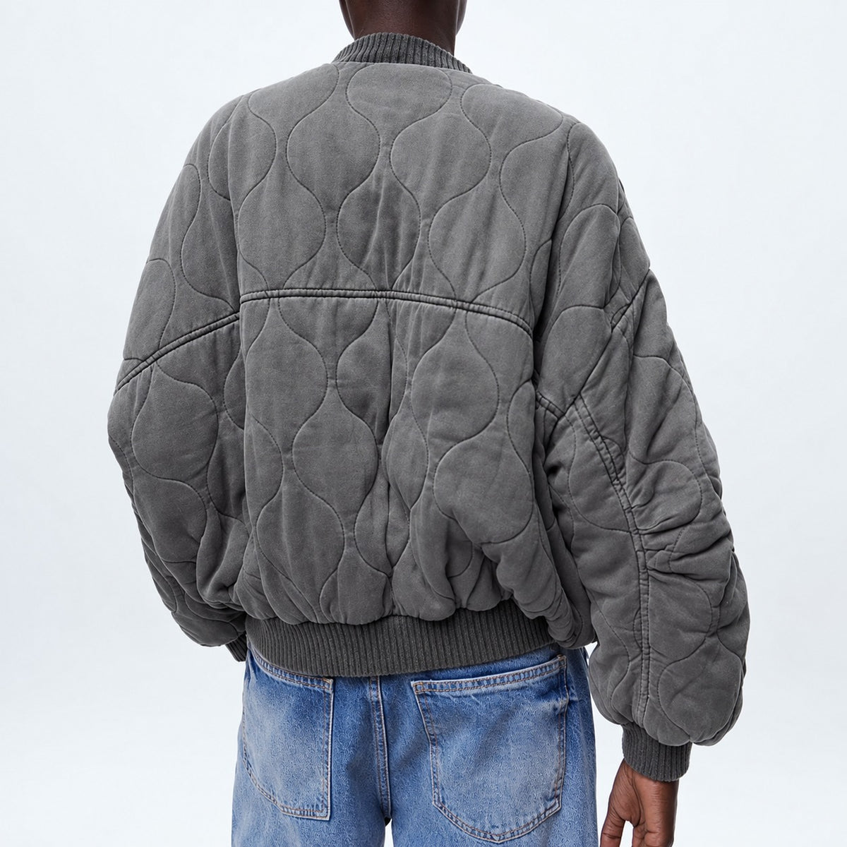 Dámská prošívaná bunda oversized s patentkami a kapsami