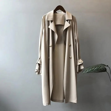 Dámský trench coat s dvojitým zapínáním a páskem na manžetách